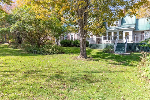 view of yard with a deck