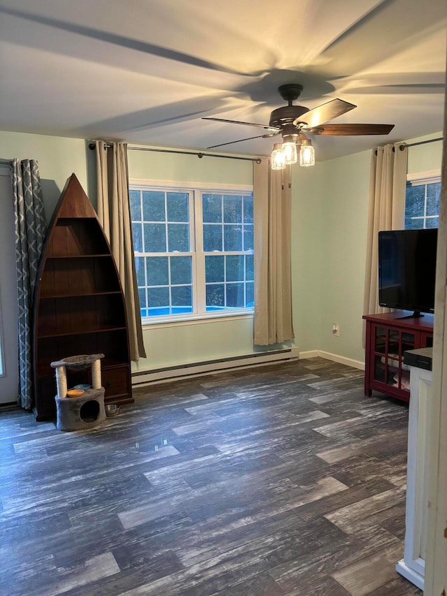 unfurnished living room featuring ceiling fan, a baseboard radiator, and dark hardwood / wood-style floors