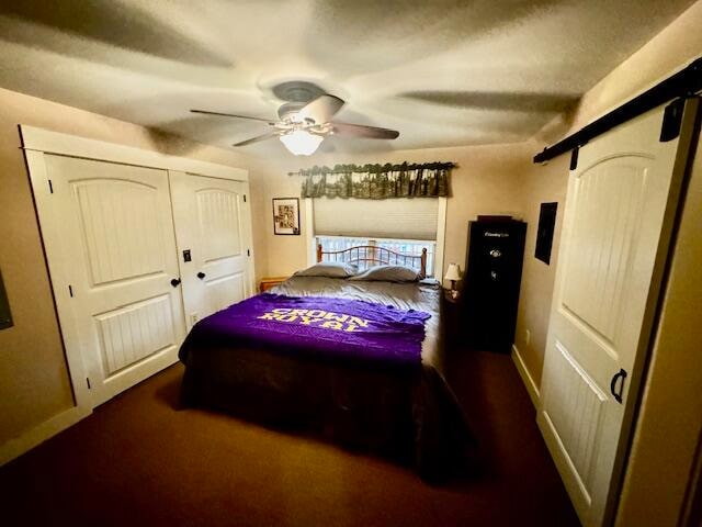 bedroom with a closet and ceiling fan