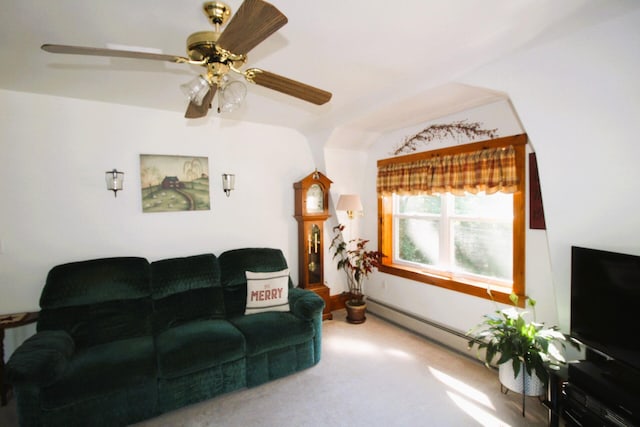 carpeted living room featuring ceiling fan