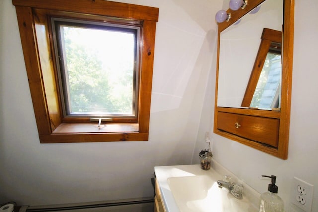 468 Curtis Rd, Swanville, ME 04915 - bathroom featuring a baseboard radiator and vanity