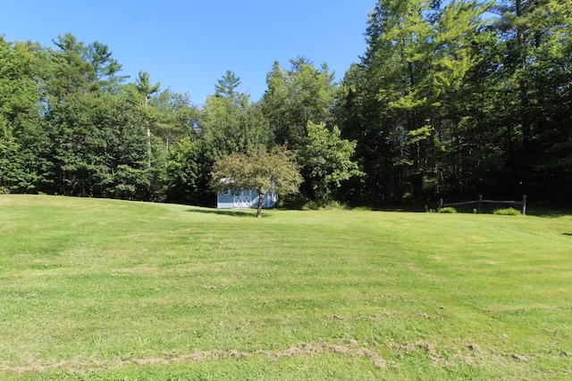 468 Curtis Rd, Swanville, ME 04915 - view of yard with a storage shed and an outdoor structure