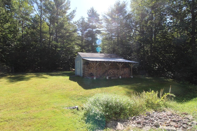 468 Curtis Rd, Swanville, ME 04915 - view of yard with an outdoor structure and a shed