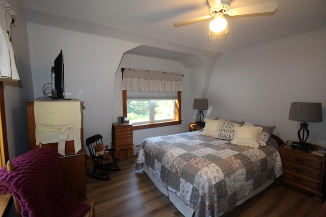 bedroom with dark wood-type flooring and ceiling fan