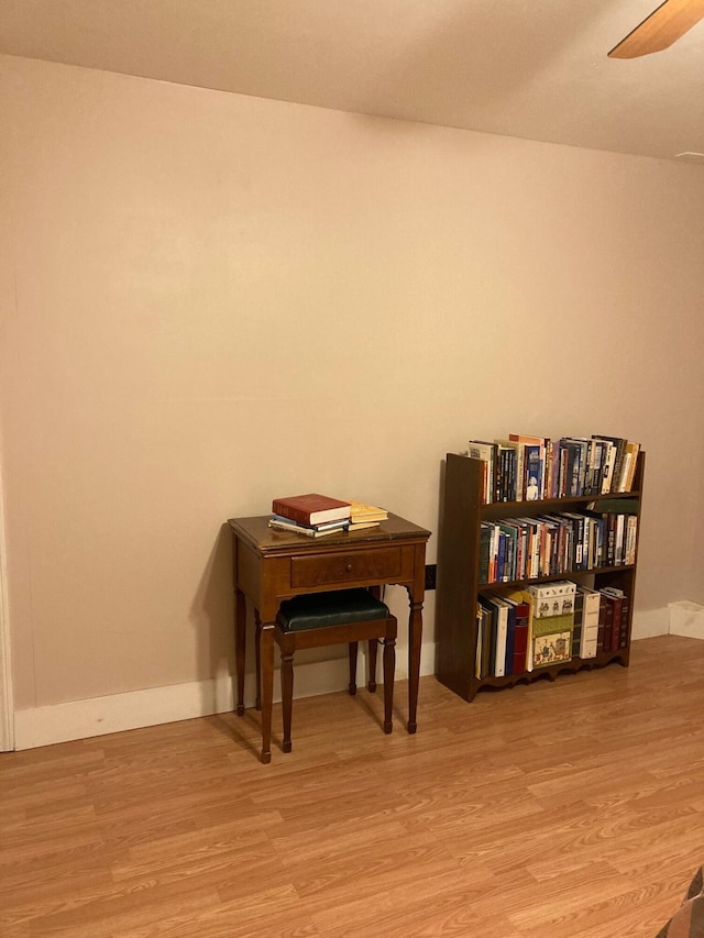 miscellaneous room featuring ceiling fan and light wood-type flooring