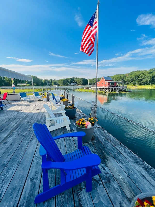 view of dock with a water view