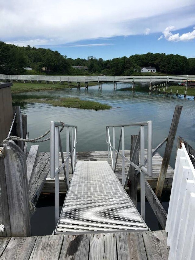 view of dock with a water view