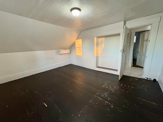 bonus room featuring lofted ceiling