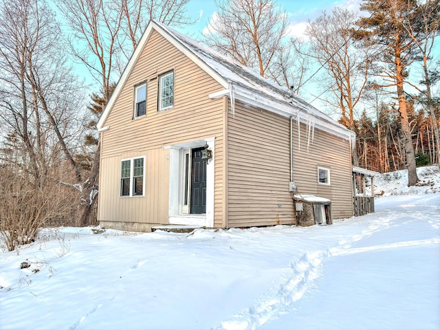 view of snow covered property