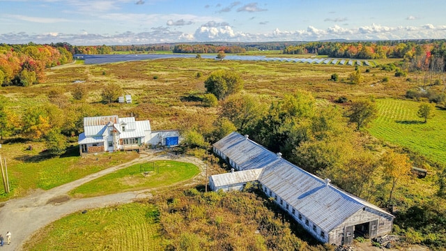 drone / aerial view with a rural view and a water view