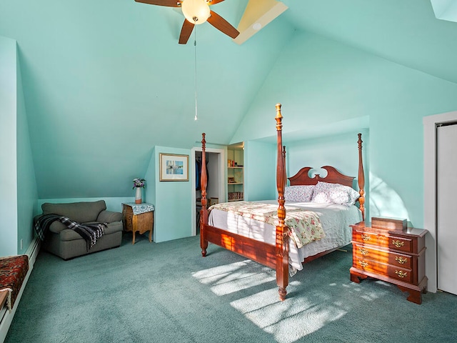 carpeted bedroom with a baseboard radiator, vaulted ceiling, and ceiling fan