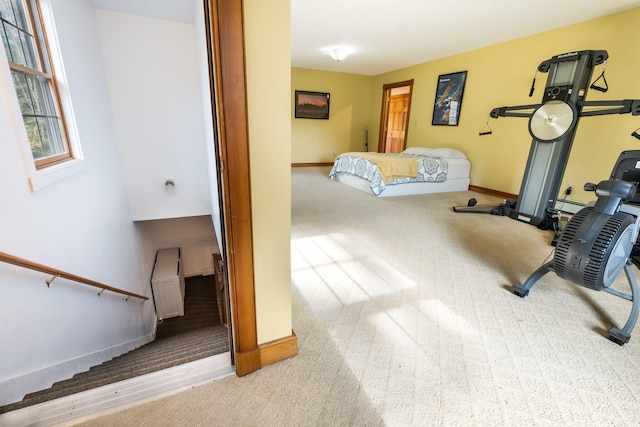 workout area with light colored carpet