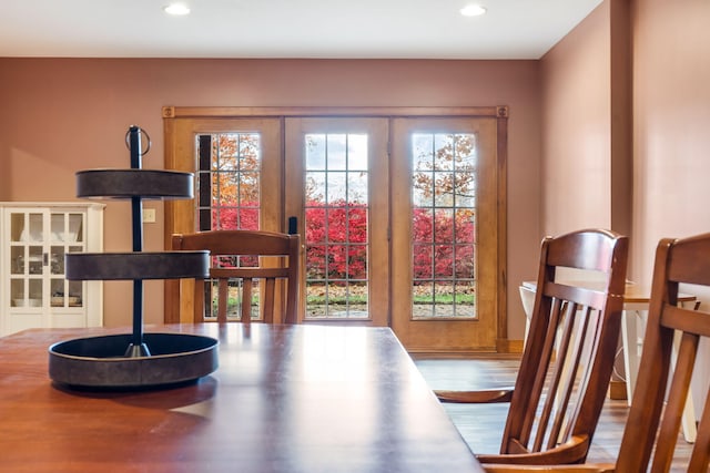 dining space featuring wood-type flooring