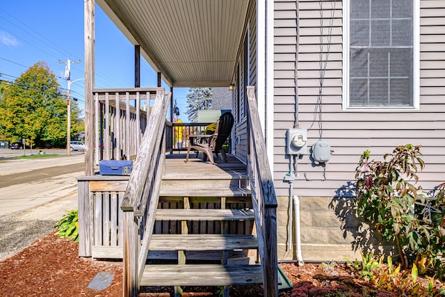 wooden deck featuring covered porch