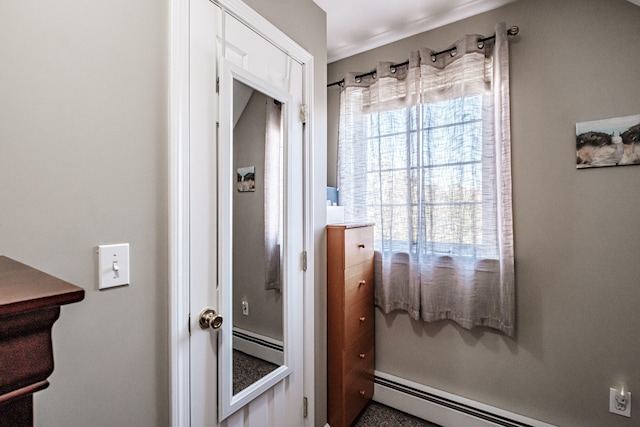 bathroom with a baseboard heating unit