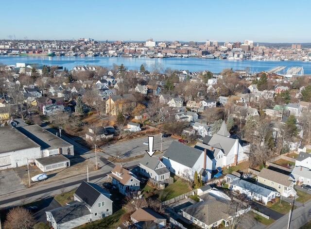 bird's eye view with a water view