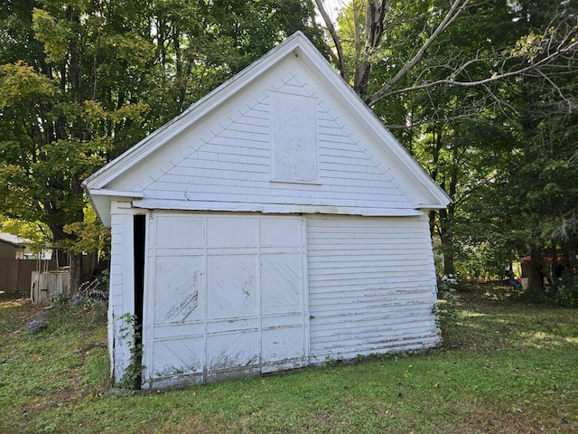 garage with a lawn