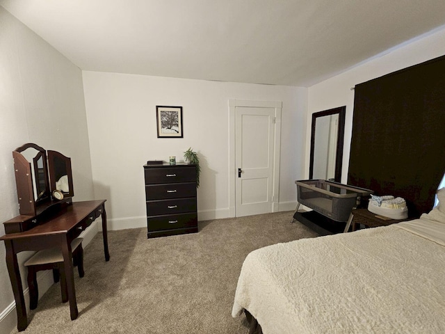 bedroom featuring carpet