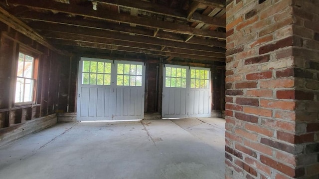 miscellaneous room featuring brick wall