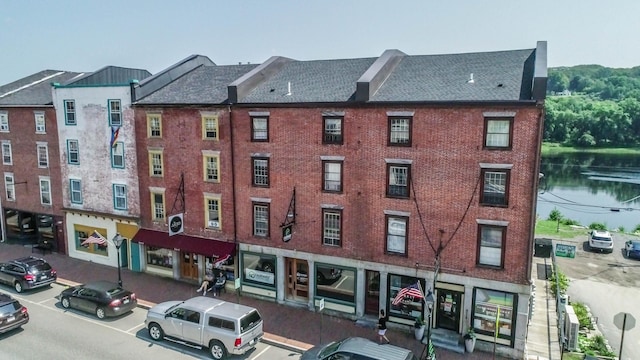 138 Water St, Hallowell, ME 04347 - view of building exterior with a water view