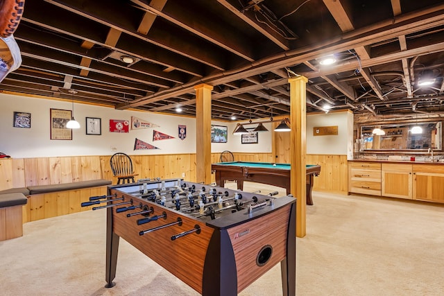 rec room featuring wood walls, billiards, and light colored carpet