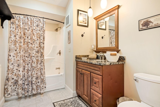 full bathroom with vanity, shower / bath combination with curtain, toilet, and tile patterned flooring