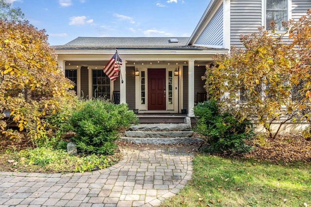 entrance to property with covered porch