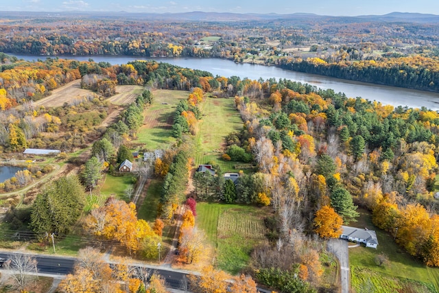 bird's eye view with a water and mountain view