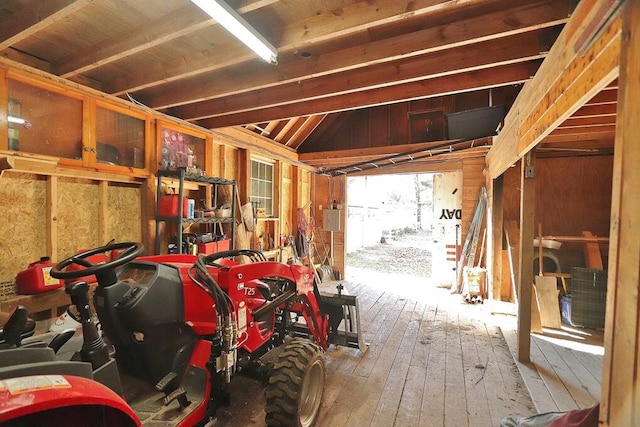 interior space featuring vaulted ceiling and hardwood / wood-style floors