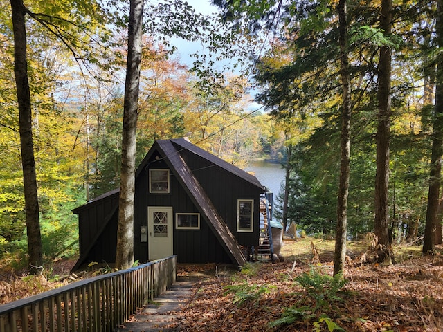 view of front of home featuring a water view