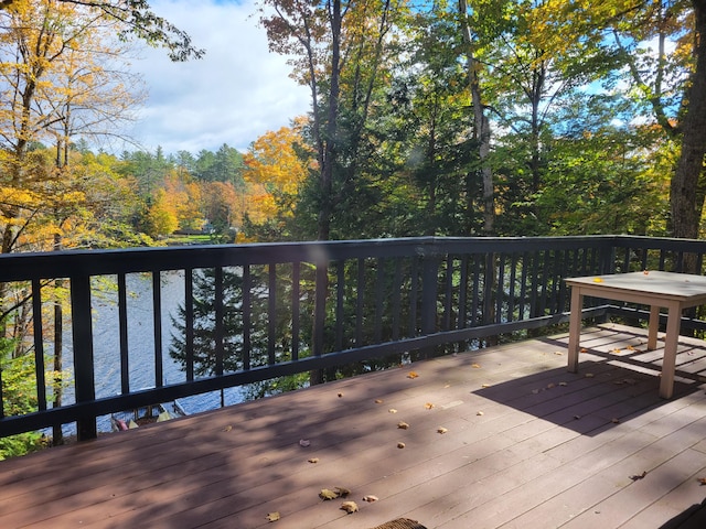 deck featuring a water view