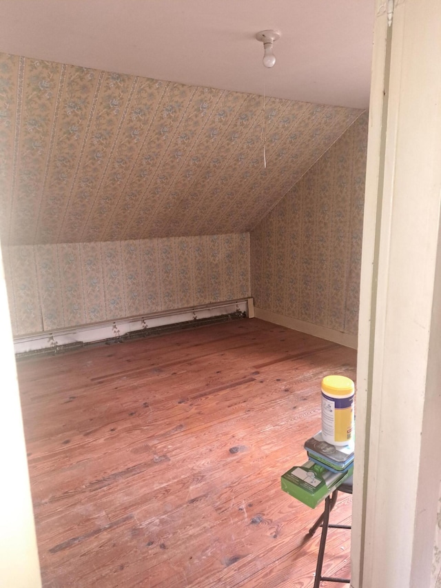 14 Fleming Rd, Bethel, ME 04217 - additional living space with vaulted ceiling, hardwood / wood-style floors, and wallpapered walls