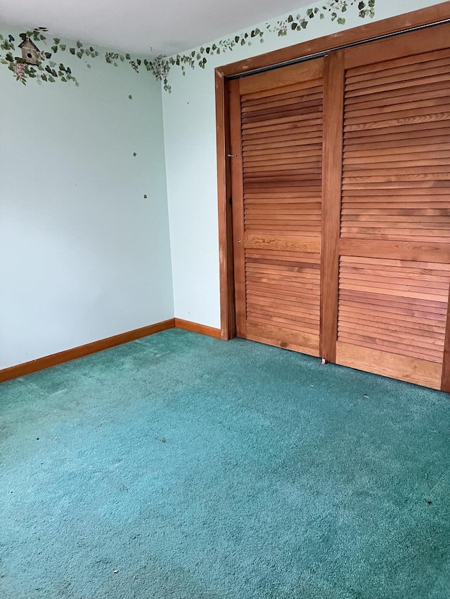 37 Spruce St, East Millinocket, ME 04430 - unfurnished bedroom with carpet floors and a closet