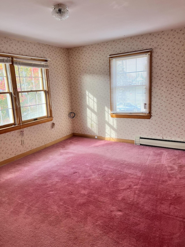37 Spruce St, East Millinocket, ME 04430 - unfurnished room featuring carpet flooring, wallpapered walls, and a baseboard radiator
