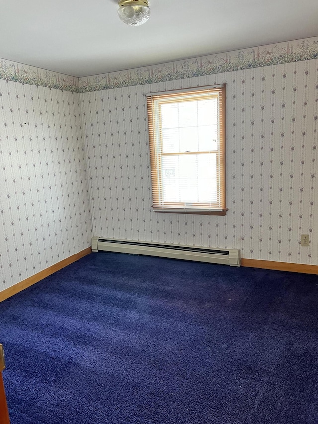 37 Spruce St, East Millinocket, ME 04430 - spare room with carpet floors, baseboard heating, and wallpapered walls