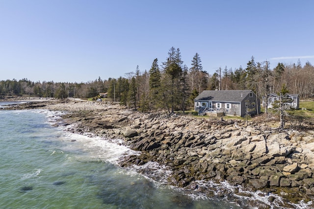 exterior space with a water view