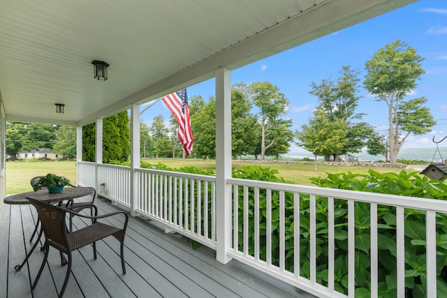 wooden terrace featuring a porch