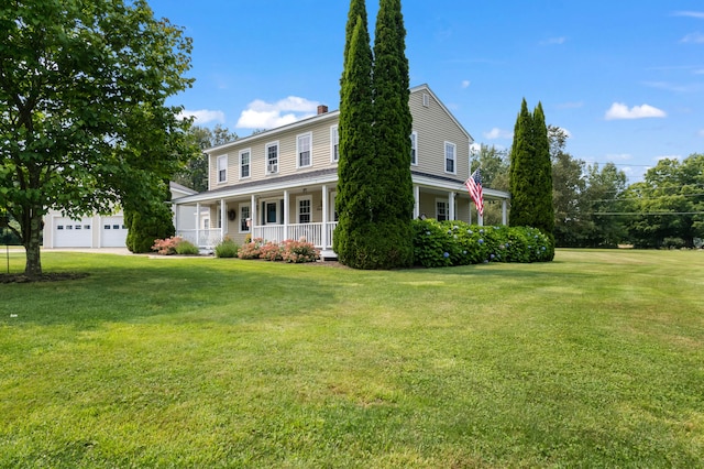 view of front of property featuring a front lawn and a porch