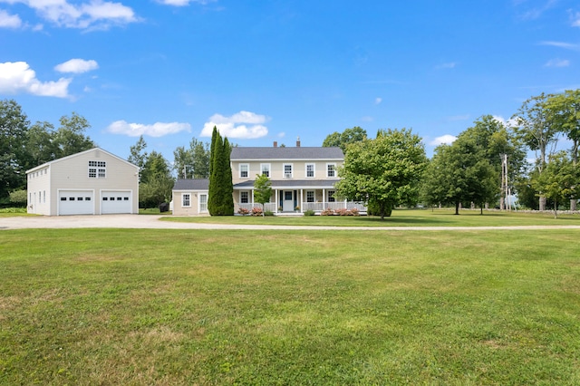 colonial inspired home featuring a front lawn