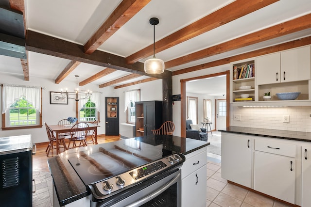 kitchen featuring decorative backsplash, white cabinets, beam ceiling, decorative light fixtures, and electric range