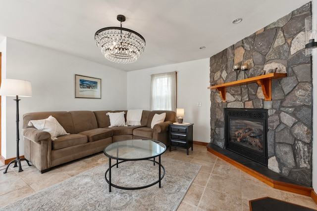 living room featuring a fireplace and an inviting chandelier