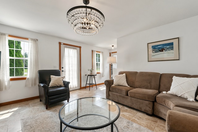 living room with an inviting chandelier