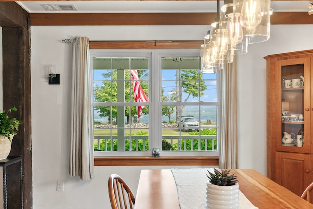 dining room featuring a chandelier