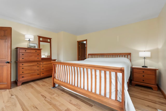 bedroom featuring light hardwood / wood-style floors