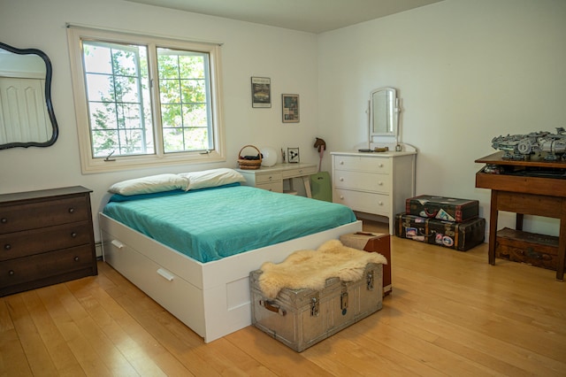 bedroom featuring light wood-type flooring