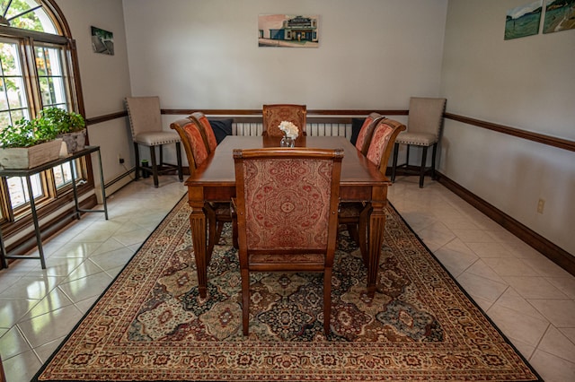 dining area with light tile patterned floors