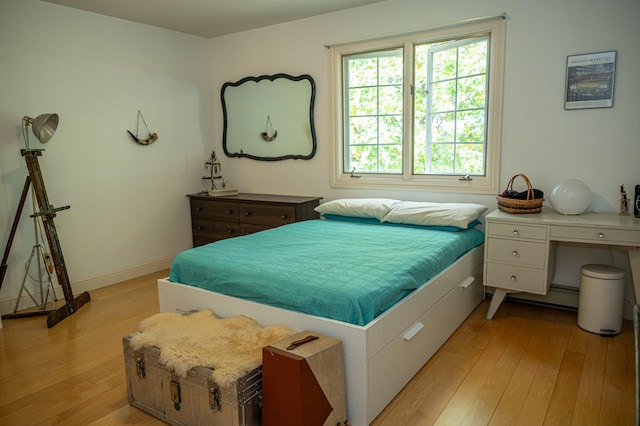 bedroom featuring light wood-type flooring