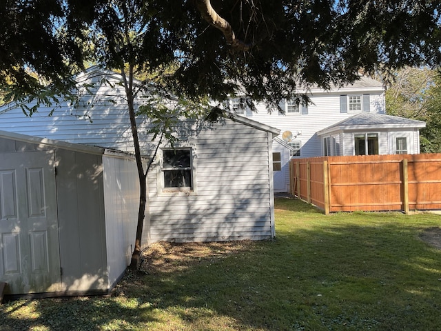 view of home's exterior with a lawn