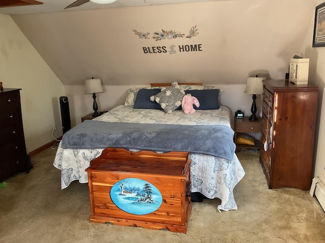 bedroom with a baseboard heating unit, light carpet, vaulted ceiling, and ceiling fan