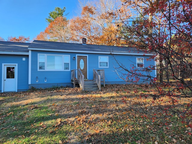 view of front of property with a front lawn